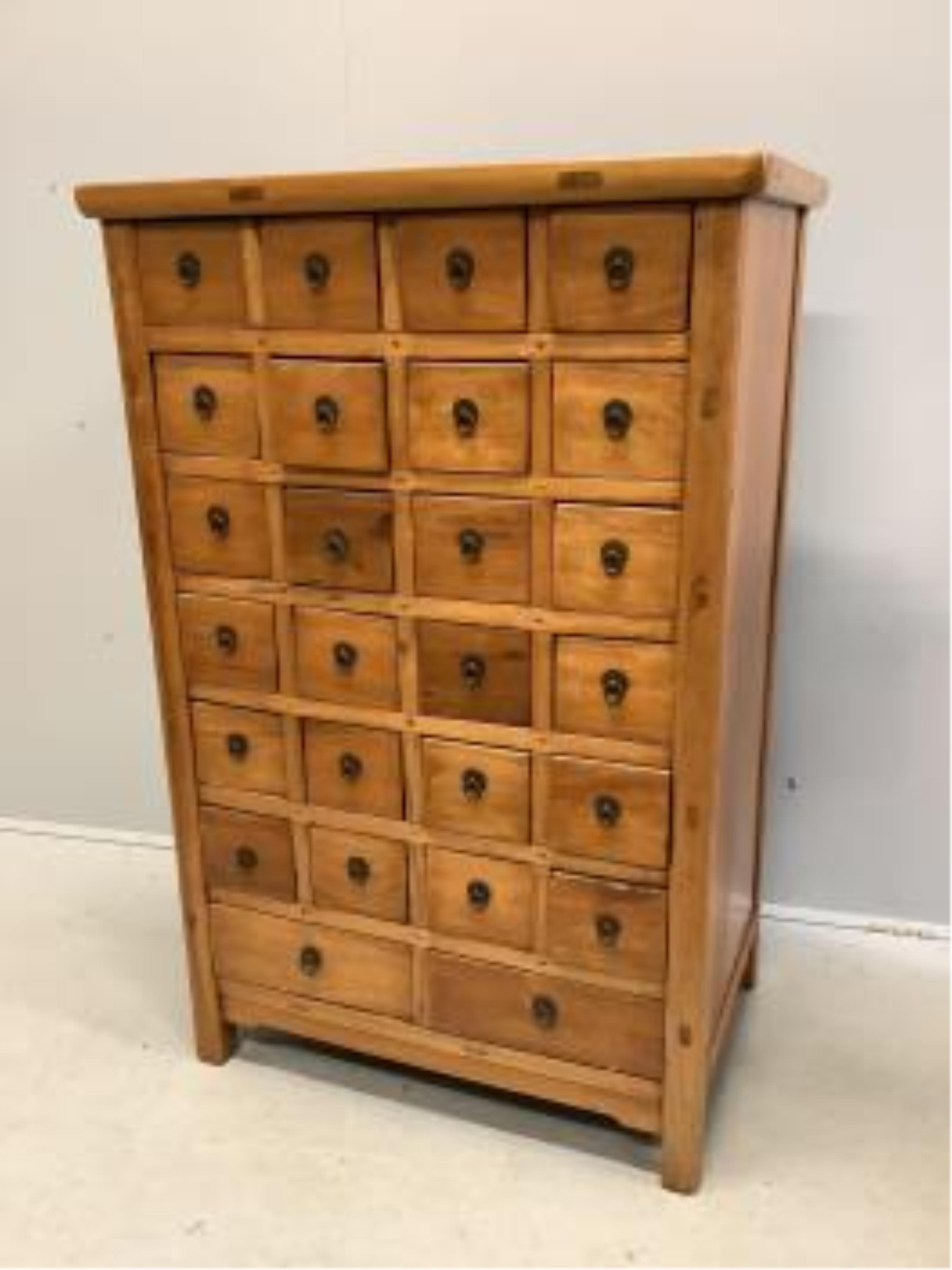 A Chinese hardwood 26 drawer medicine chest, width 84cm, depth 56cm, height 128cm. Condition - good